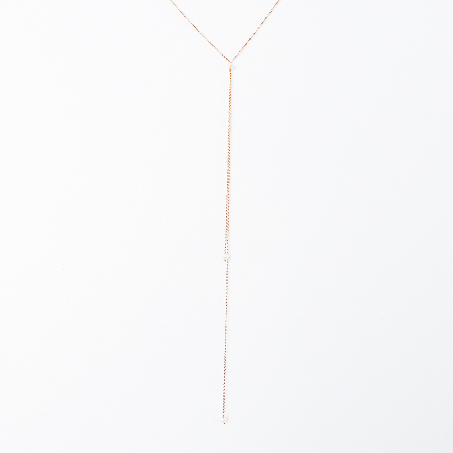 Short and long drop necklace with a white pearl pendant