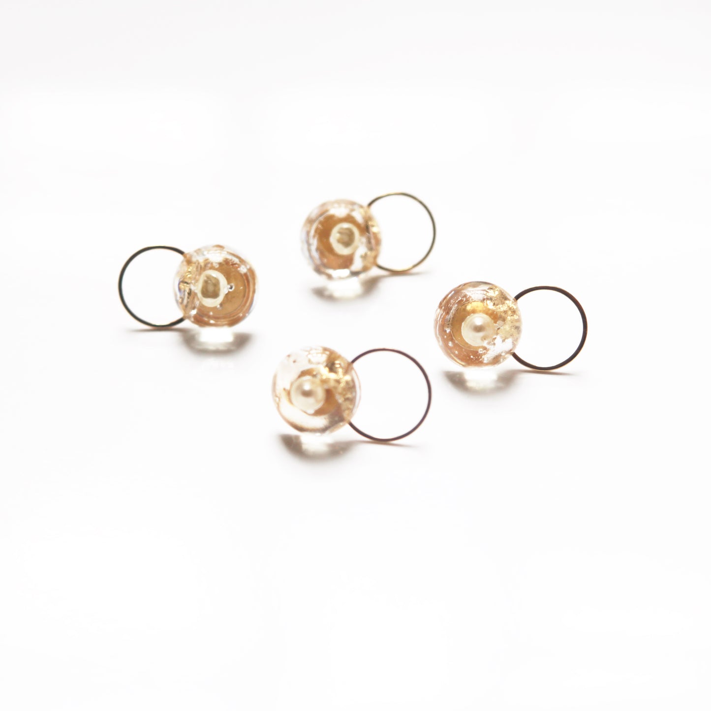 Chic Golden Hoop Earrings with Circle Art resin design, adorned with delicate freshwater Pearl and a golden leaf accent