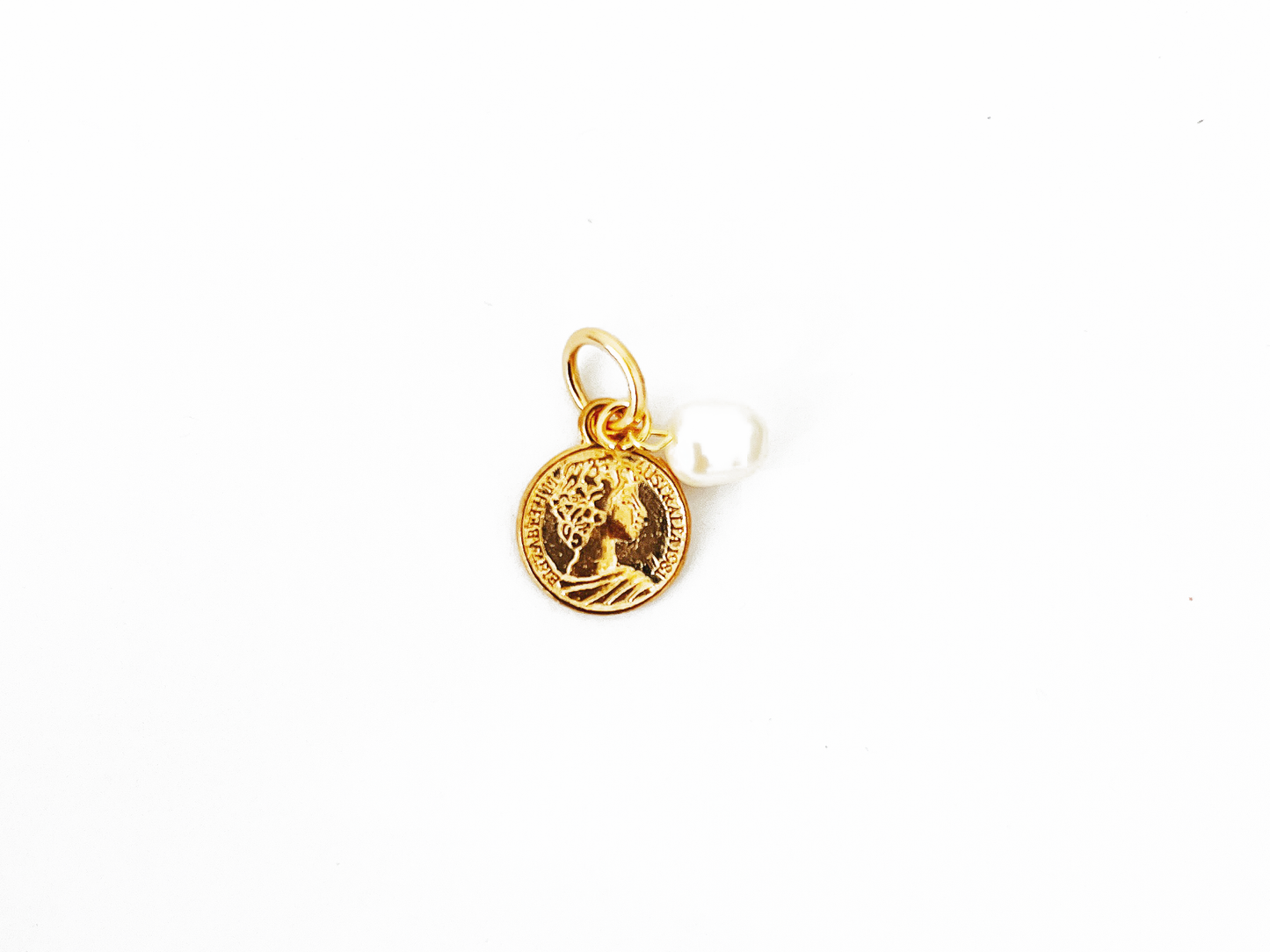 Charm antique coin with a small freshwater white pearl by Hikaru Pearl