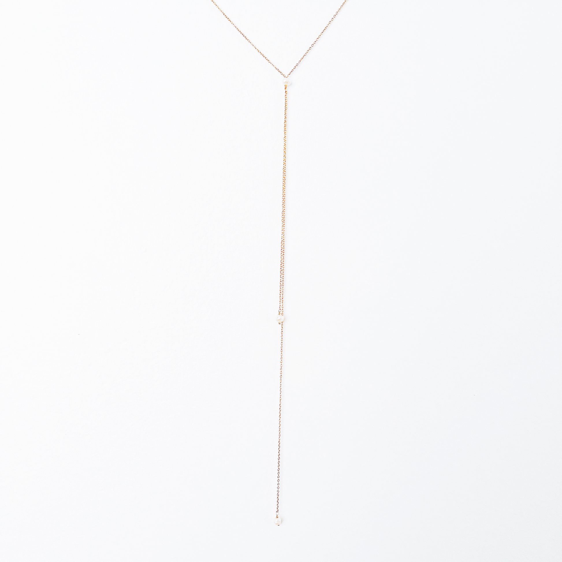 Short and long drop necklace with a white pearl pendant