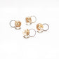 Chic Golden Hoop Earrings with Circle Art resin design, adorned with delicate freshwater Pearl and a golden leaf accent